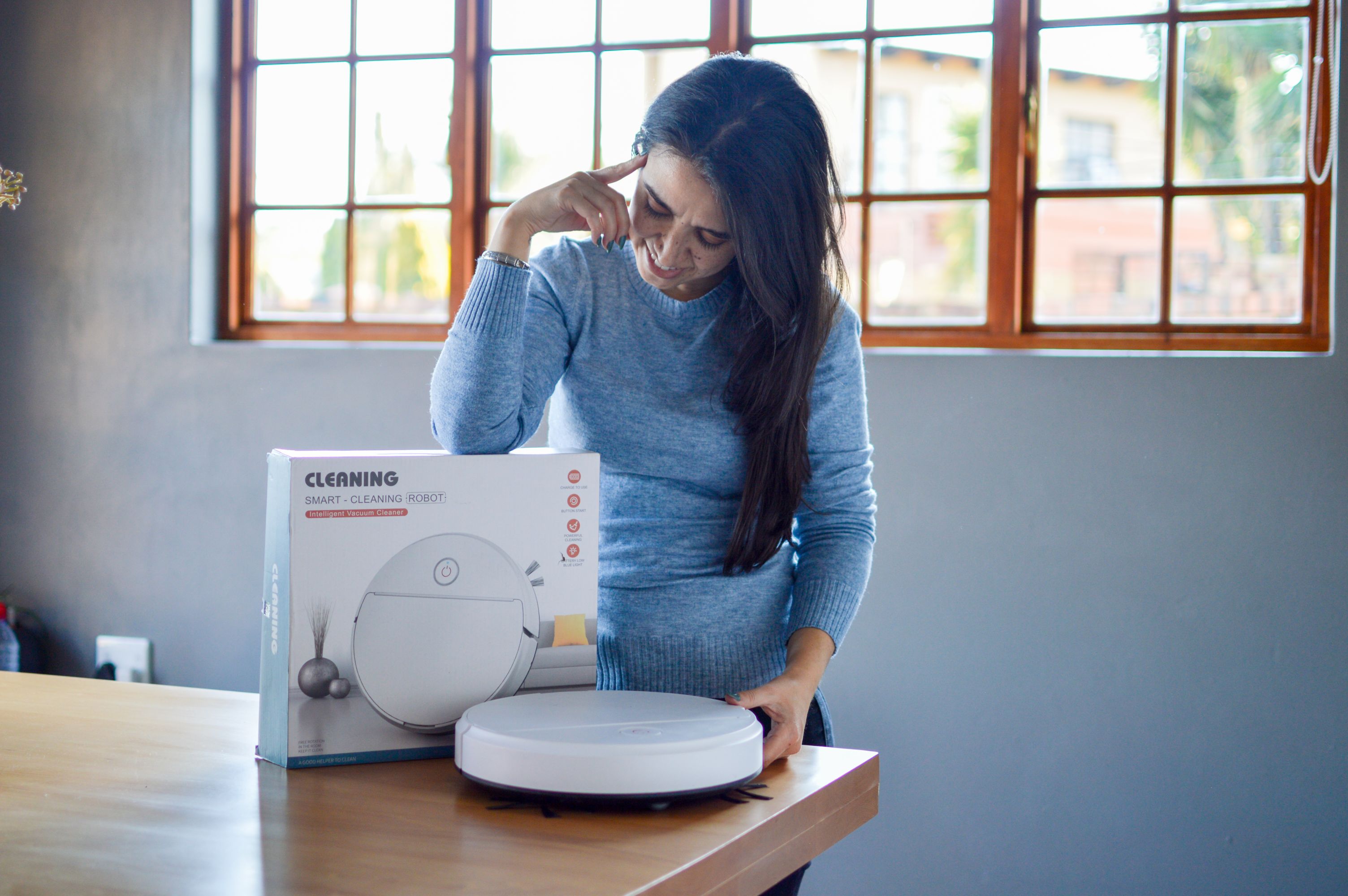 Unboxing the "buggy" Vacuum cleaning robot- Santcher Online